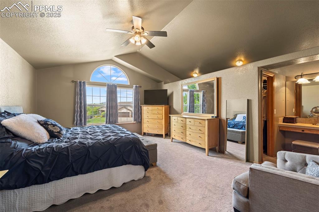 Image 19 of 41: Master bedroom with sitting area