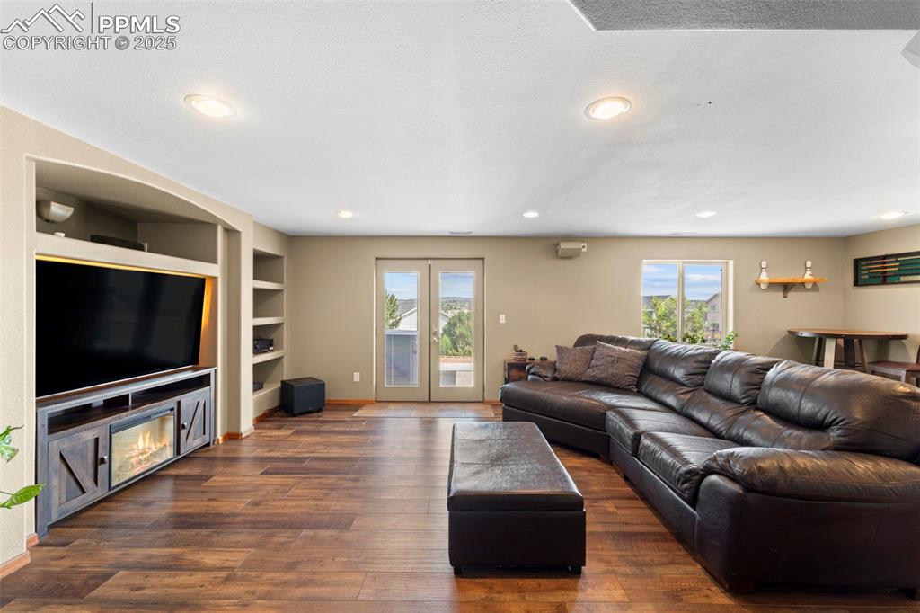Image 27 of 41: Basement family room with walkout.