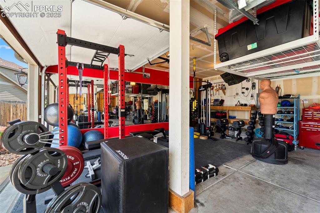 Image 34 of 41: Flex space in 3rd garage bay