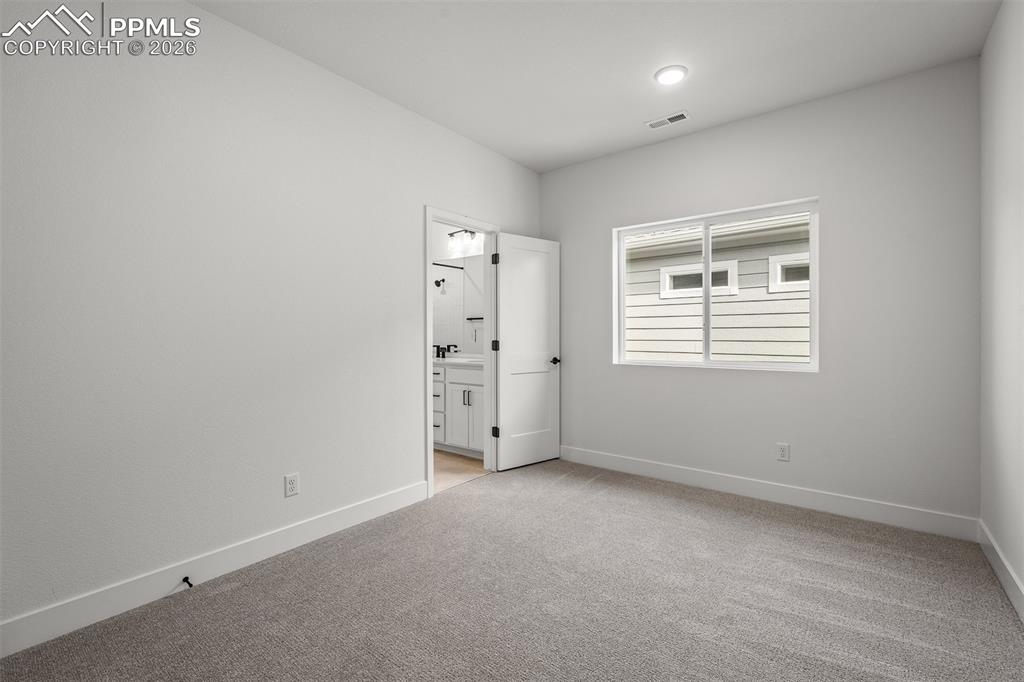 Image 31 of 39: Bedroom