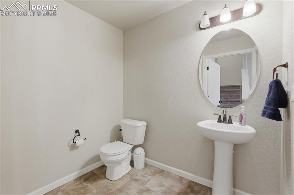 Image 11 of 37: Half Bathroom on Main Floor