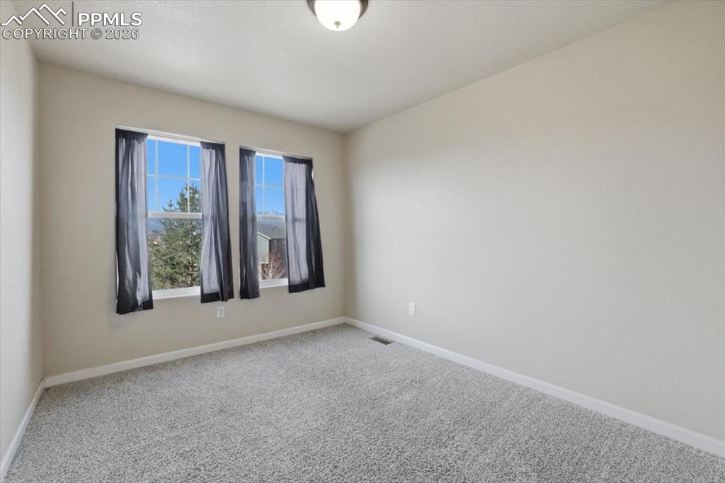 Image 22 of 37: Bedroom