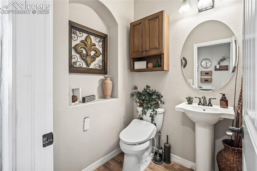 Image 37 of 46: Main Floor Powder Bathroom