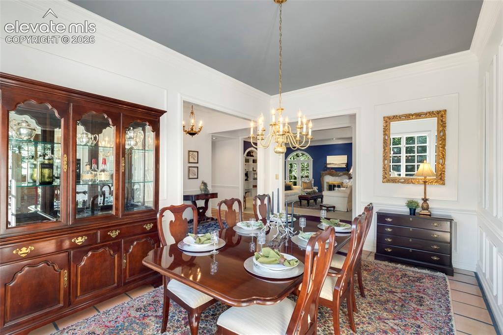 Image 10 of 50: Formal separate dining room open to the main hallway and living room