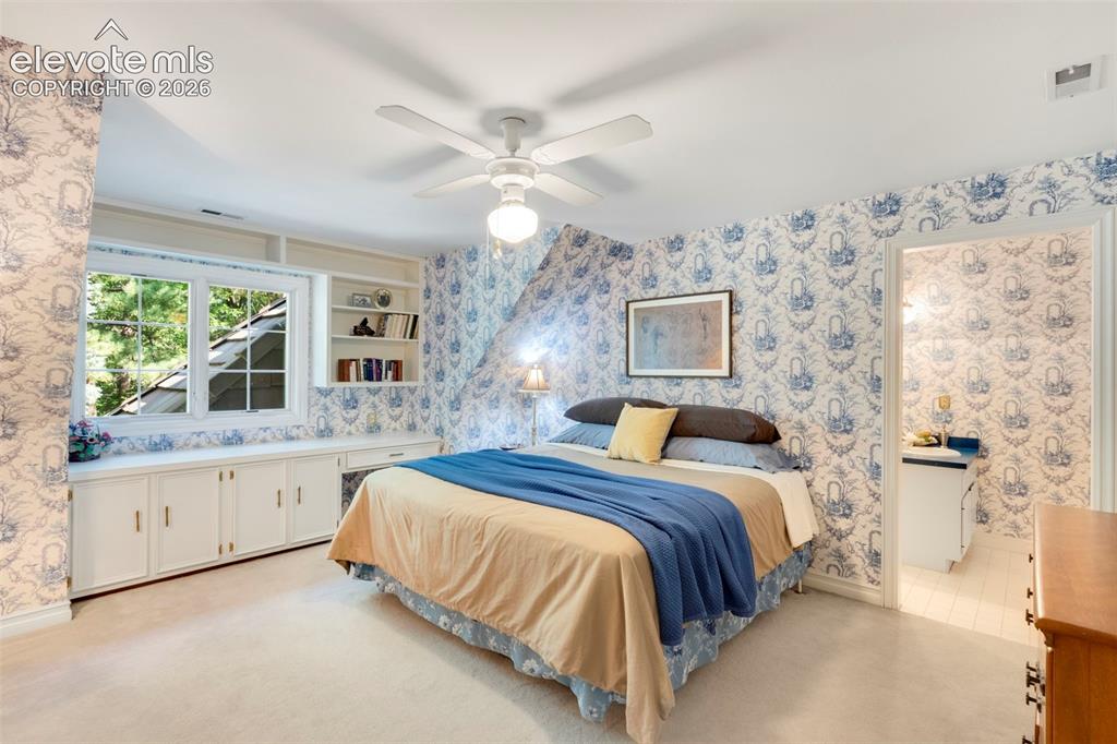Image 32 of 50: Upstairs bedroom with Jack N Jill bath