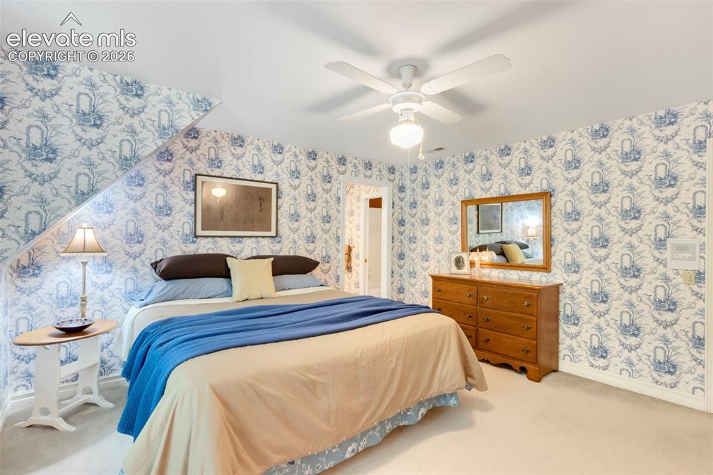 Image 34 of 50: Upstairs bedroom with Jack N Jill bath