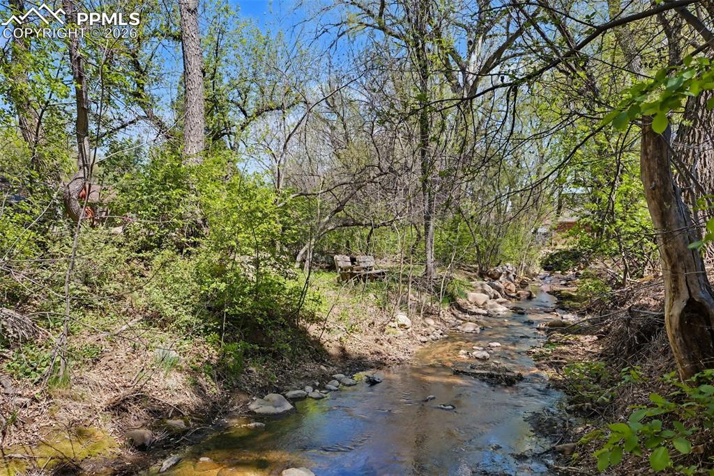Image 44 of 46: Stream at back of property