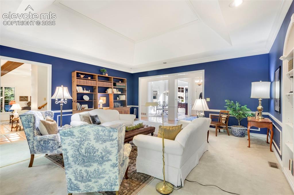 Image 6 of 50: Living room open to family room