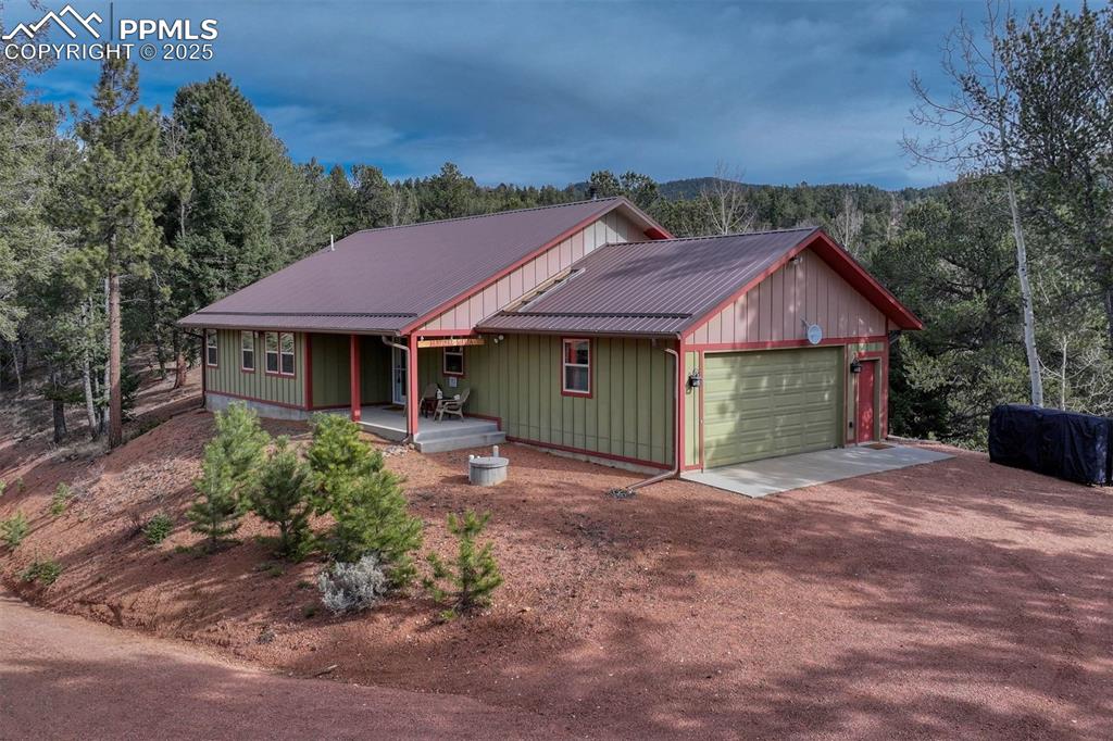 Image 7 of 30: The perfect porch...covered for year round viewing of the wildlife & the su