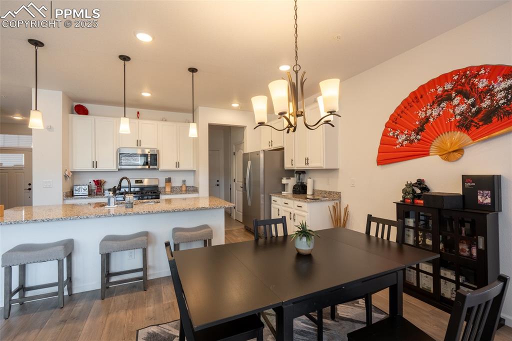 Image 13 of 40: Dining area/kitchen - main floor