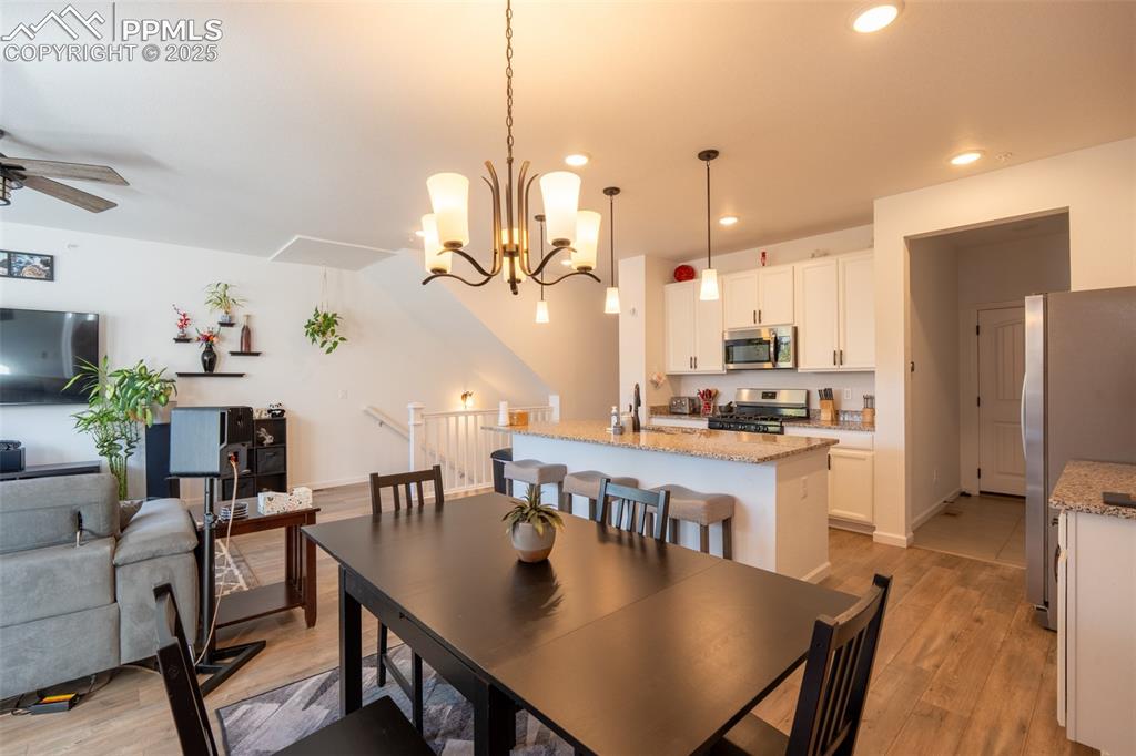 Image 13 of 40: Dining area/kitchen/living room - main floor