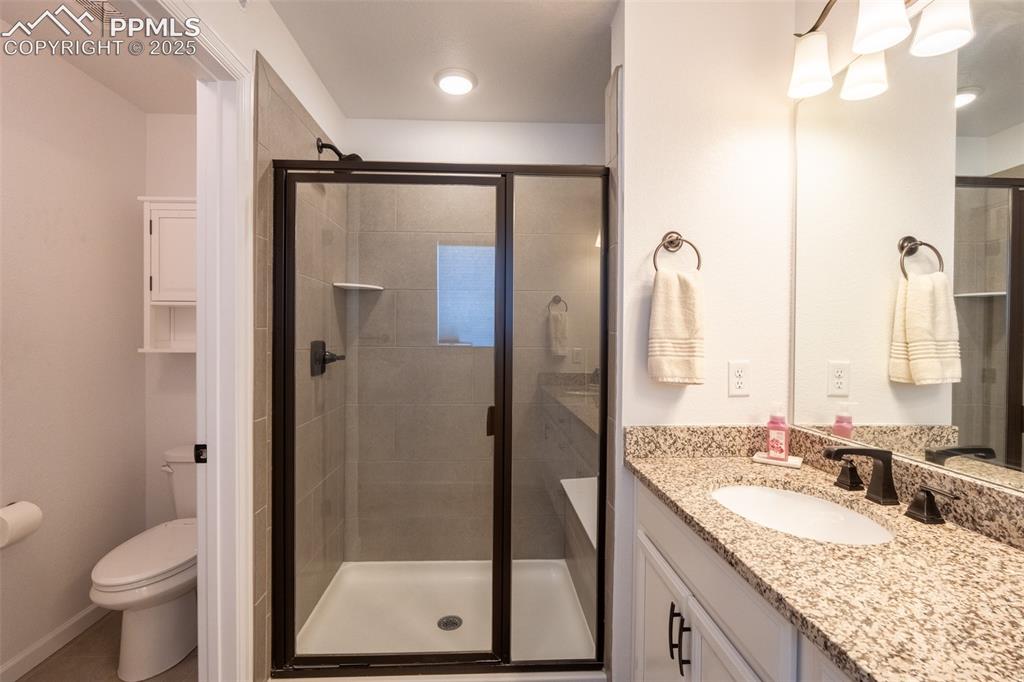 Image 24 of 40: Primary 3/4 bathroom (3) with dual sinks - upper floor