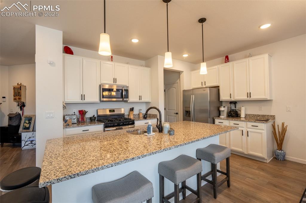 Image 7 of 40: Kitchen/mud room off garage entry - main floor
