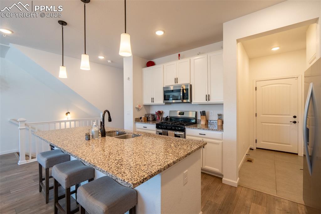 Image 8 of 40: Kitchen/mud room off garage entry - main floor