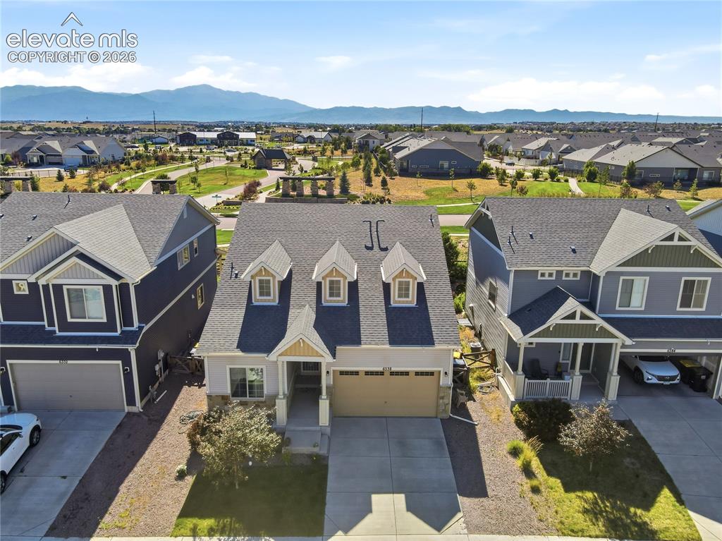 Image 40 of 47: Contemporary residential property featuring a neutral-toned exterior with s