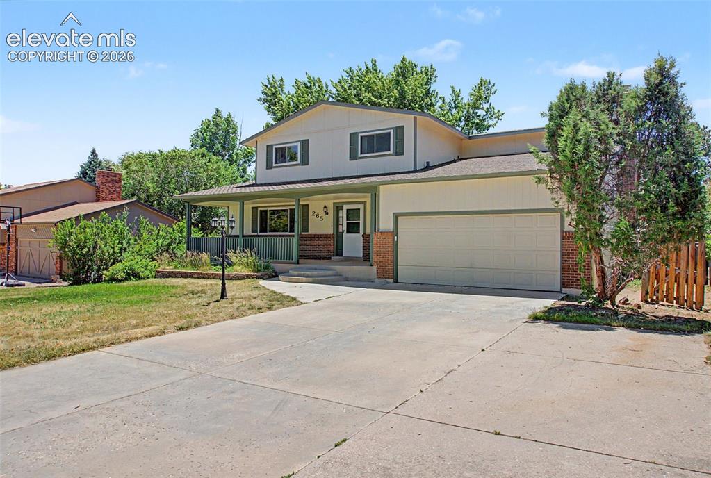 Image 3 of 49: The home has an attached 2-car garage!