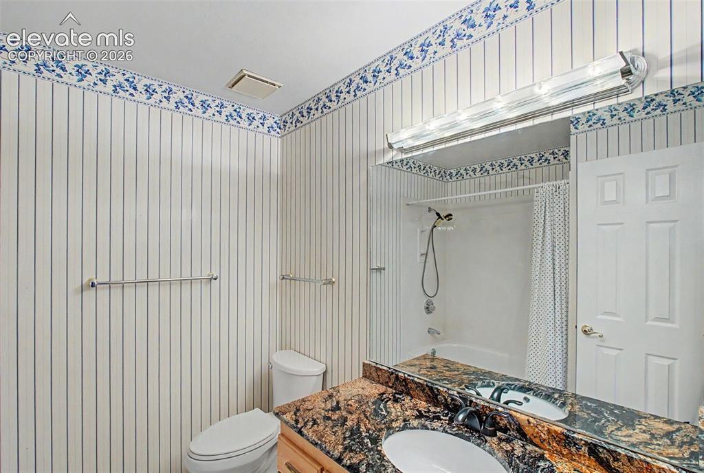 Image 35 of 49: Upstairs secondary full bathroom