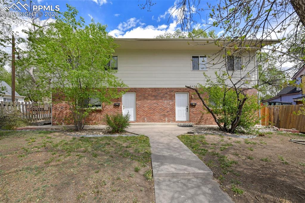 Image 1 of 22: Front Of Duplex, Showing Entry Doors To Both Units