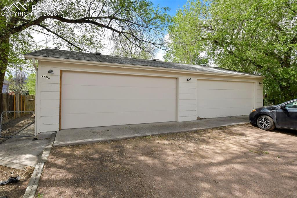 Image 20 of 22: Two 2-Car Detached Garages - One For Each Unit