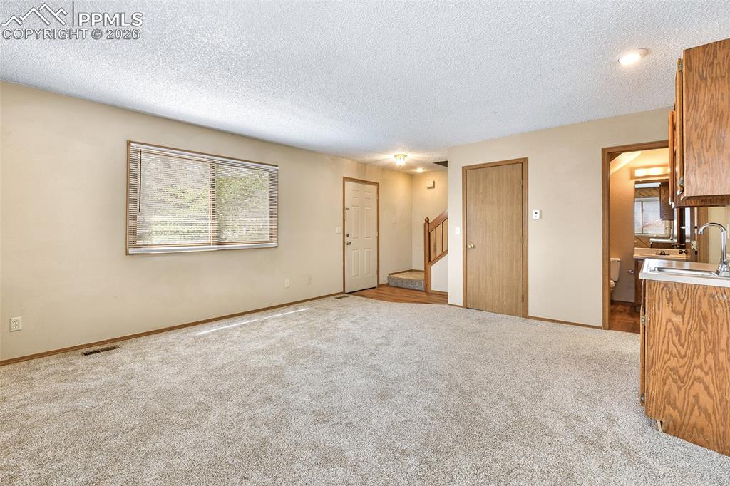 Image 4 of 22: Living Room With View Of Front Entrance
