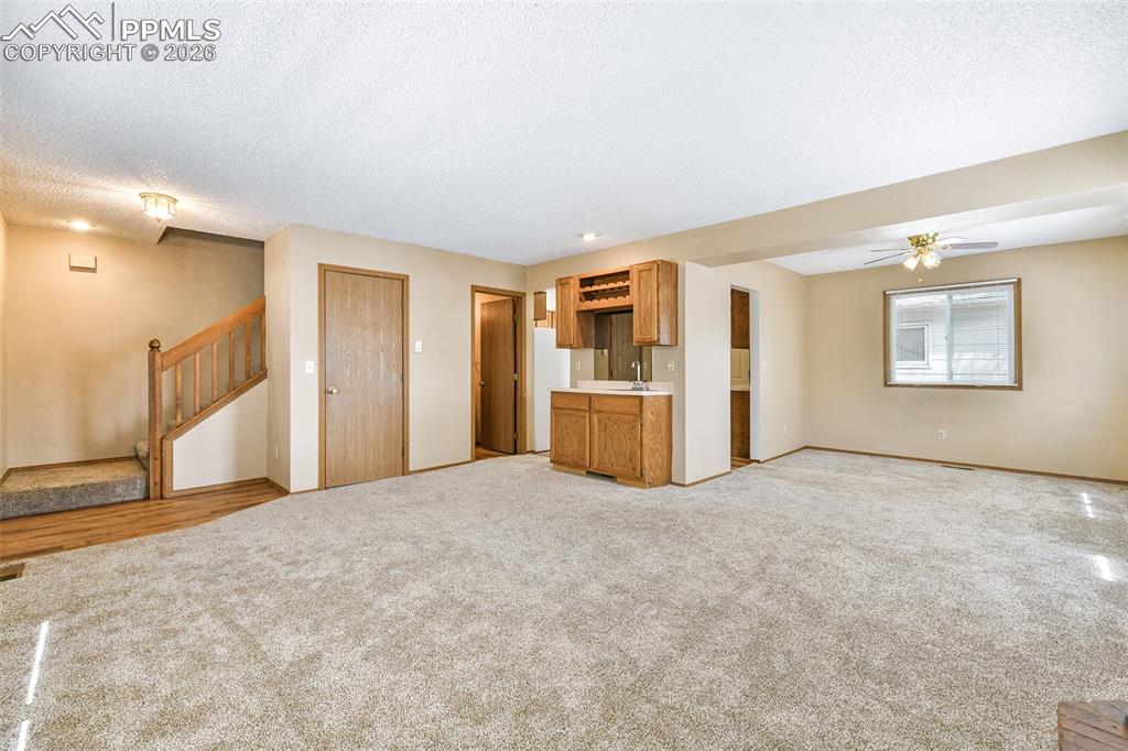 Image 5 of 22: Living Room With View Into Dining Room