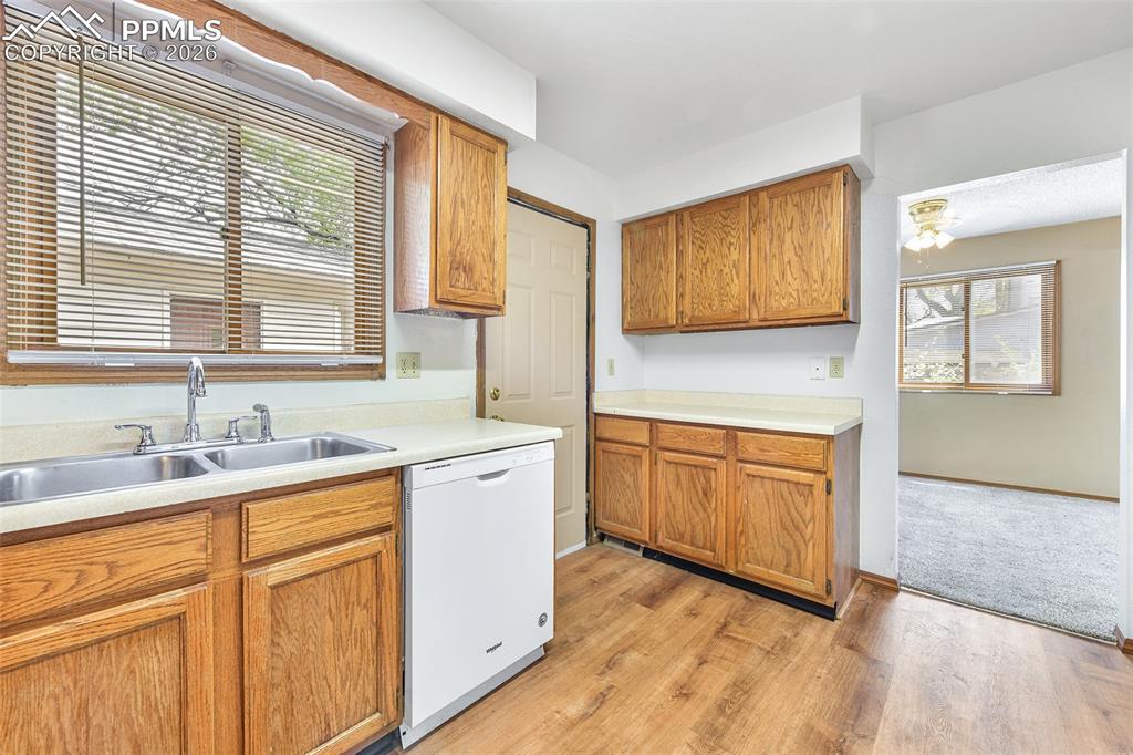 Image 7 of 22: Kitchen With View Into Dining Room