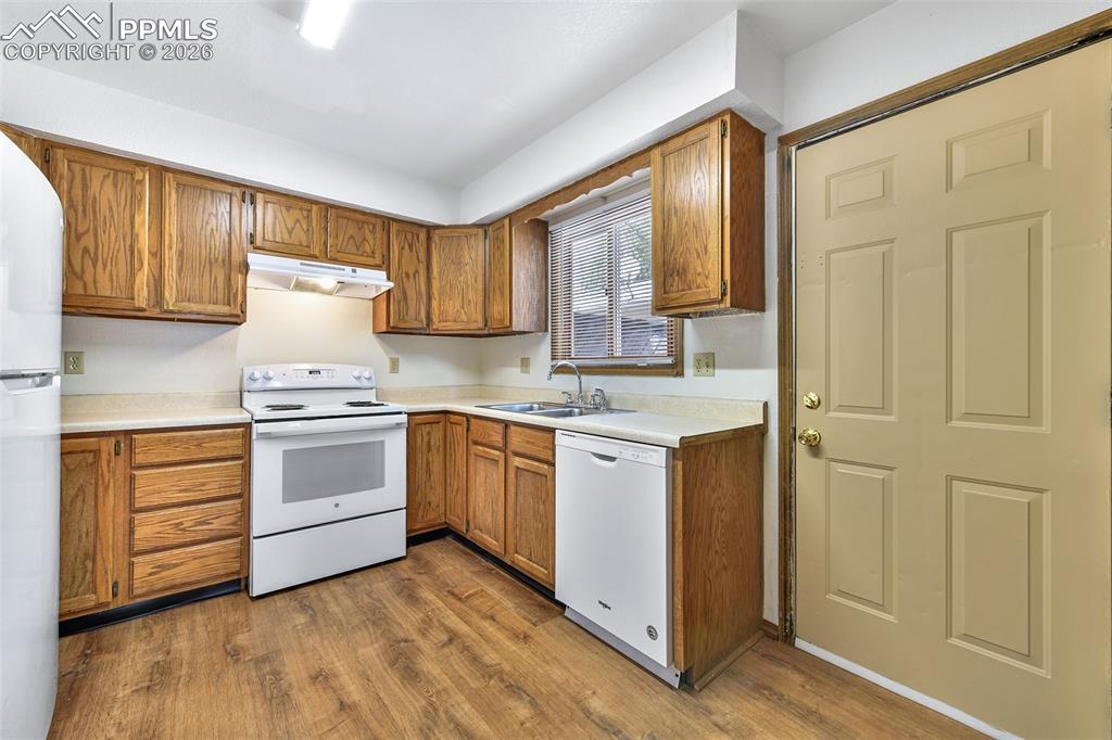 Image 9 of 22: Kitchen With Door To Patio And To Detached Garage