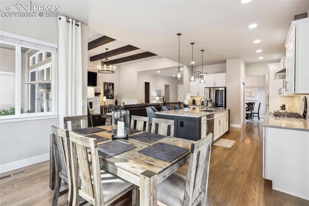 Image 13 of 48: Spacious eat-in dining