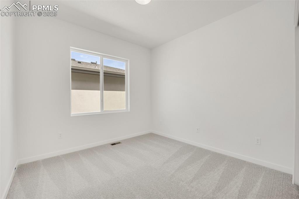 Image 22 of 35: Bedroom