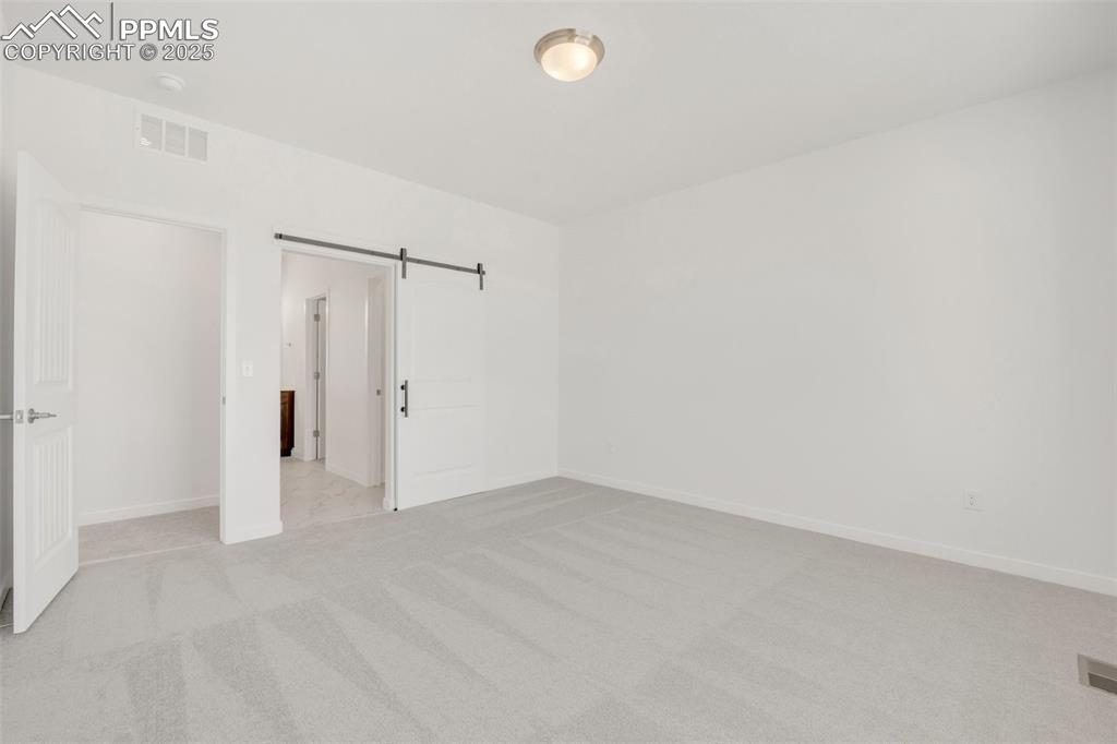 Image 29 of 35: Master Bedroom