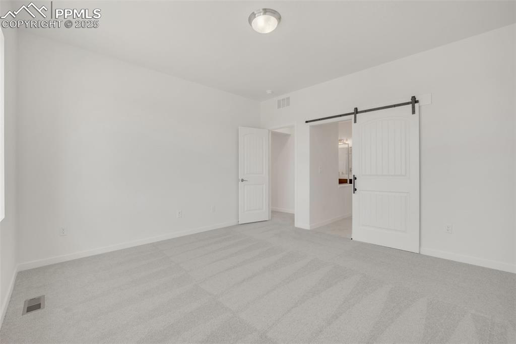 Image 30 of 35: Master Bedroom