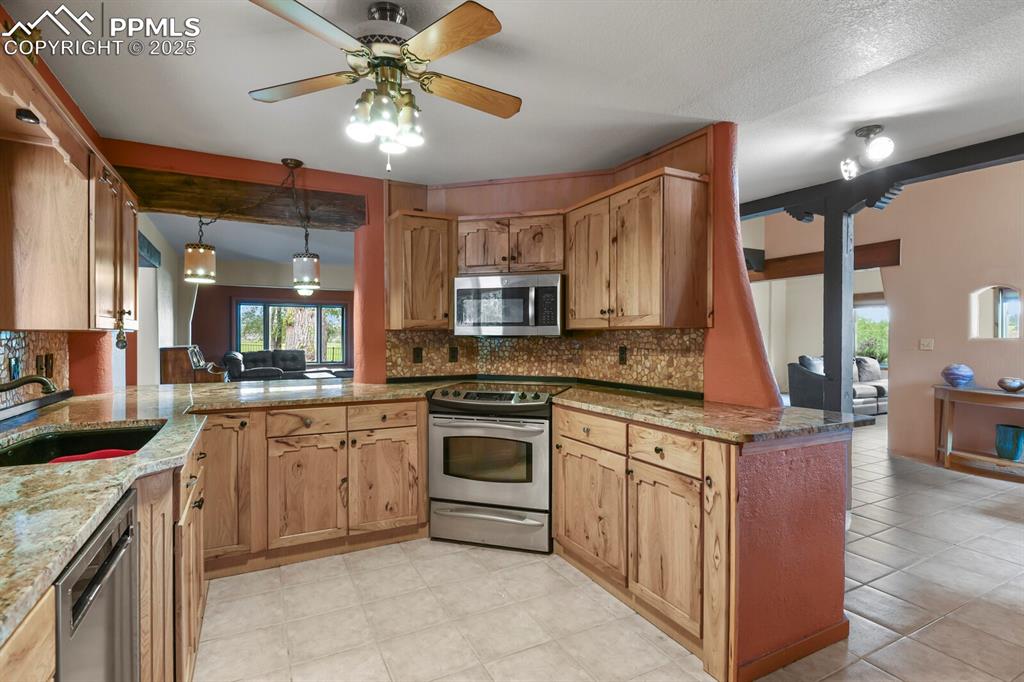 Image 10 of 48: Kitchen
