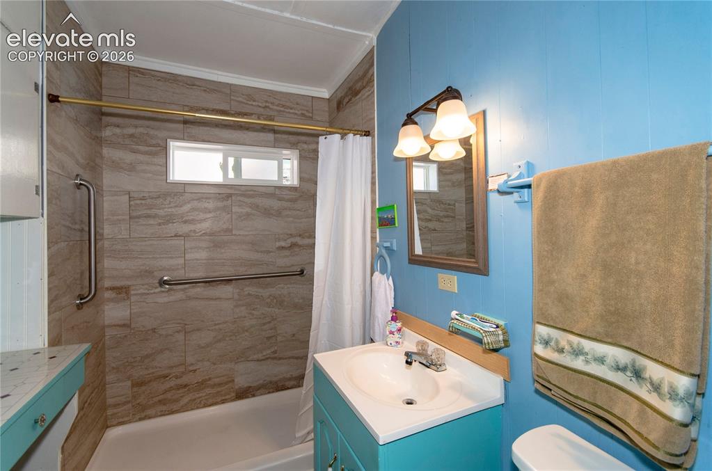 Image 8 of 27: Remodeled Bath