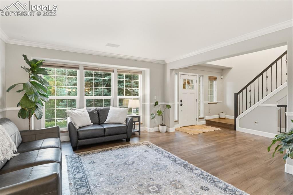 Image 2 of 35: Modern feel with LVP and updated trim and paint