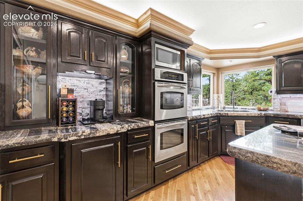 Image 11 of 50: Recently Refinished Hickory Cabinets