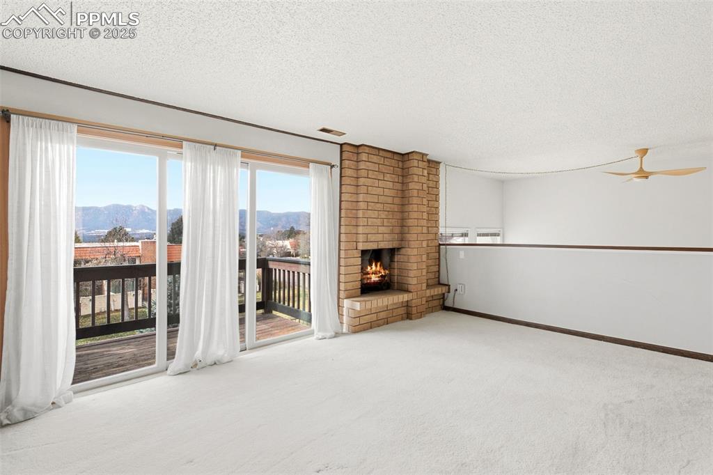 Image 25 of 45: Primary Bedroom with a mountain view