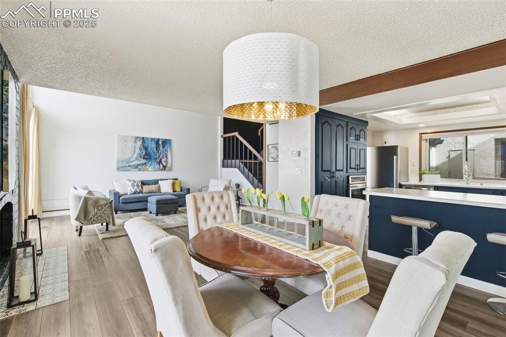 Image 34 of 45: Dining room walking out to the patio