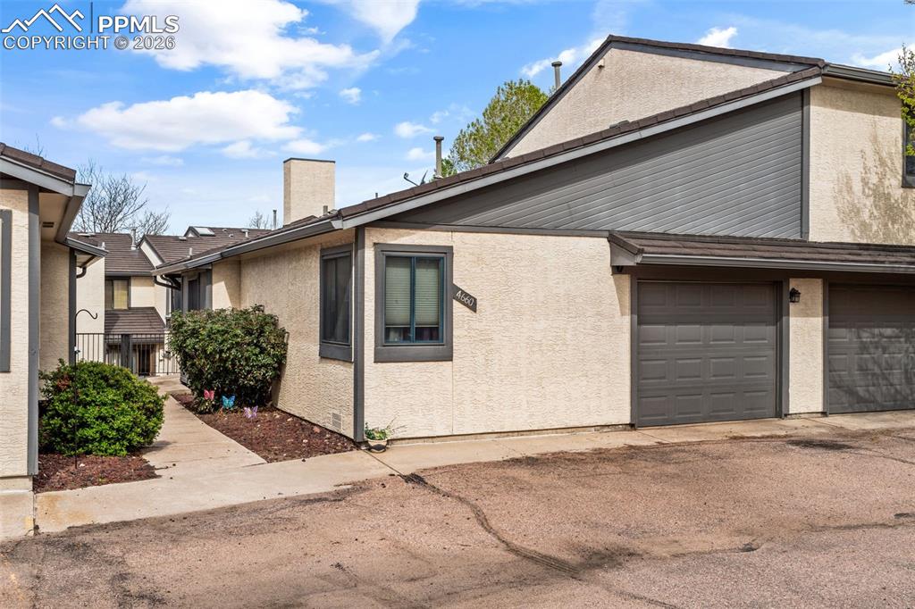 Image 1 of 25: Front of home with garage