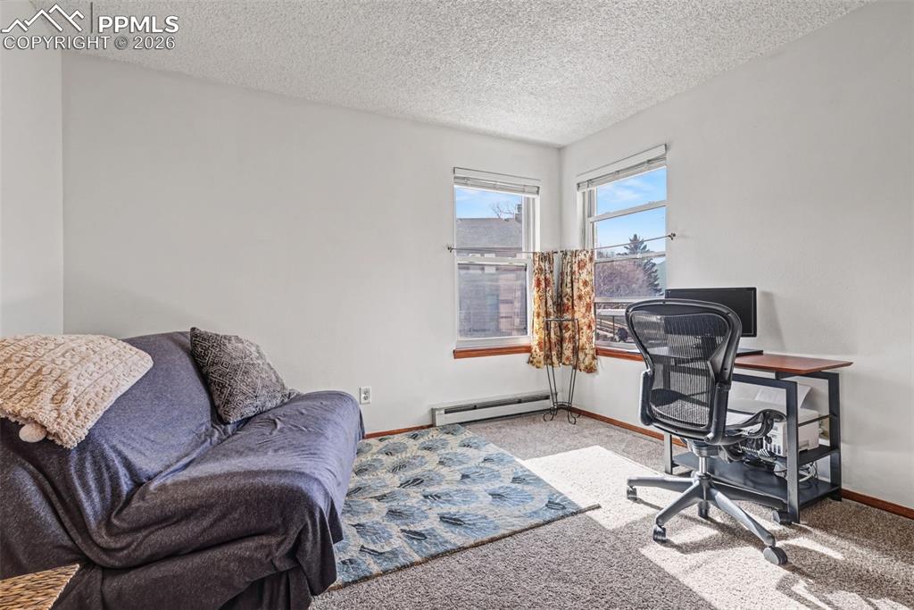 Image 10 of 20: Bedroom 2, upper level, faces SW