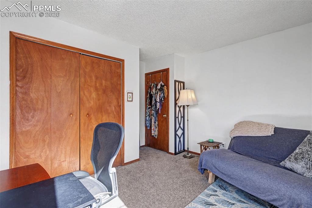 Image 11 of 20: Bedroom 2 being used as an office 