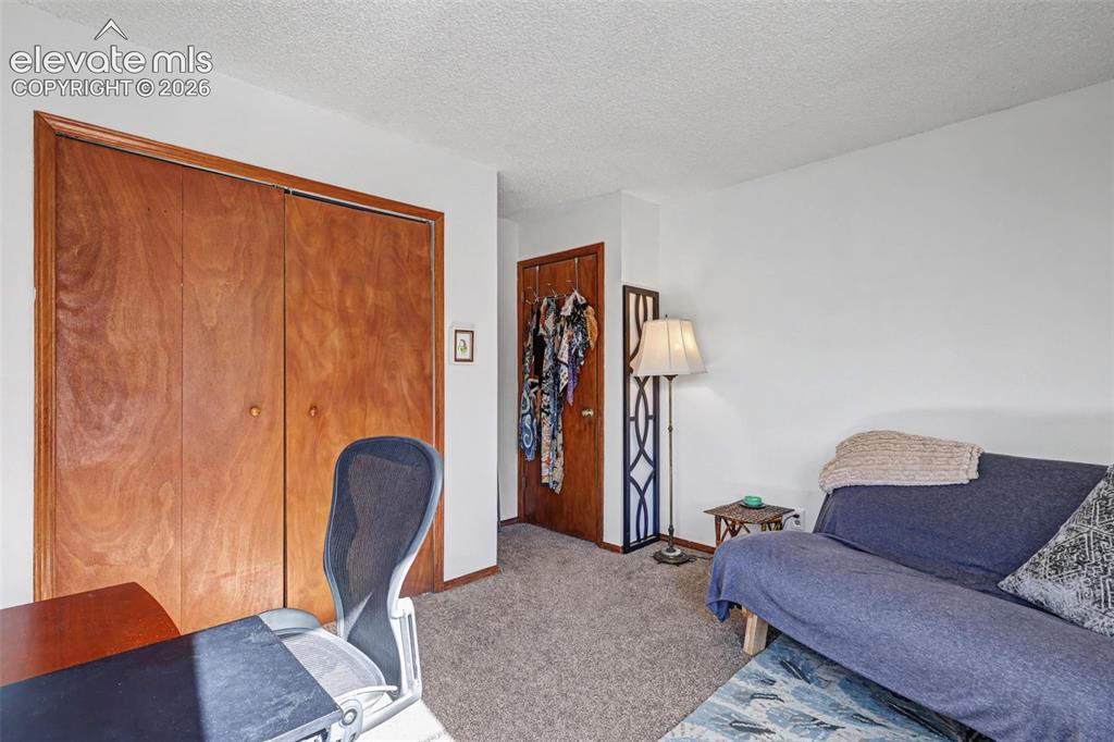 Image 11 of 23: Bedroom 2 being used as an office