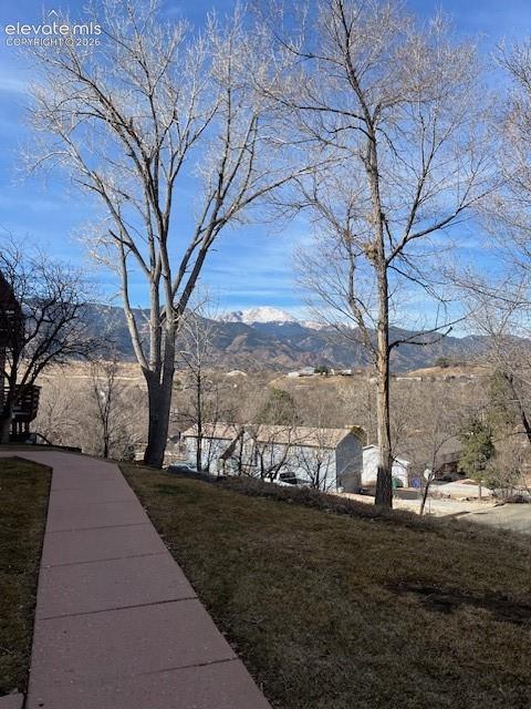 Image 16 of 23: Mountain views from the sidewalk in front of the bldg