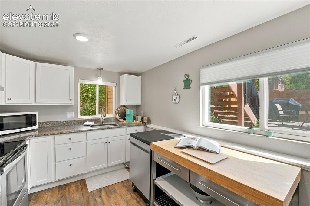 Image 35 of 50: Lower level kitchen has also been updated!