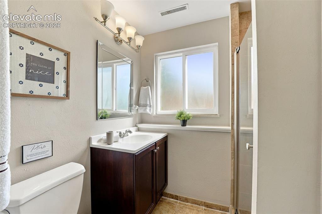 Image 40 of 50: Updated lower level 3/4 bathroom.