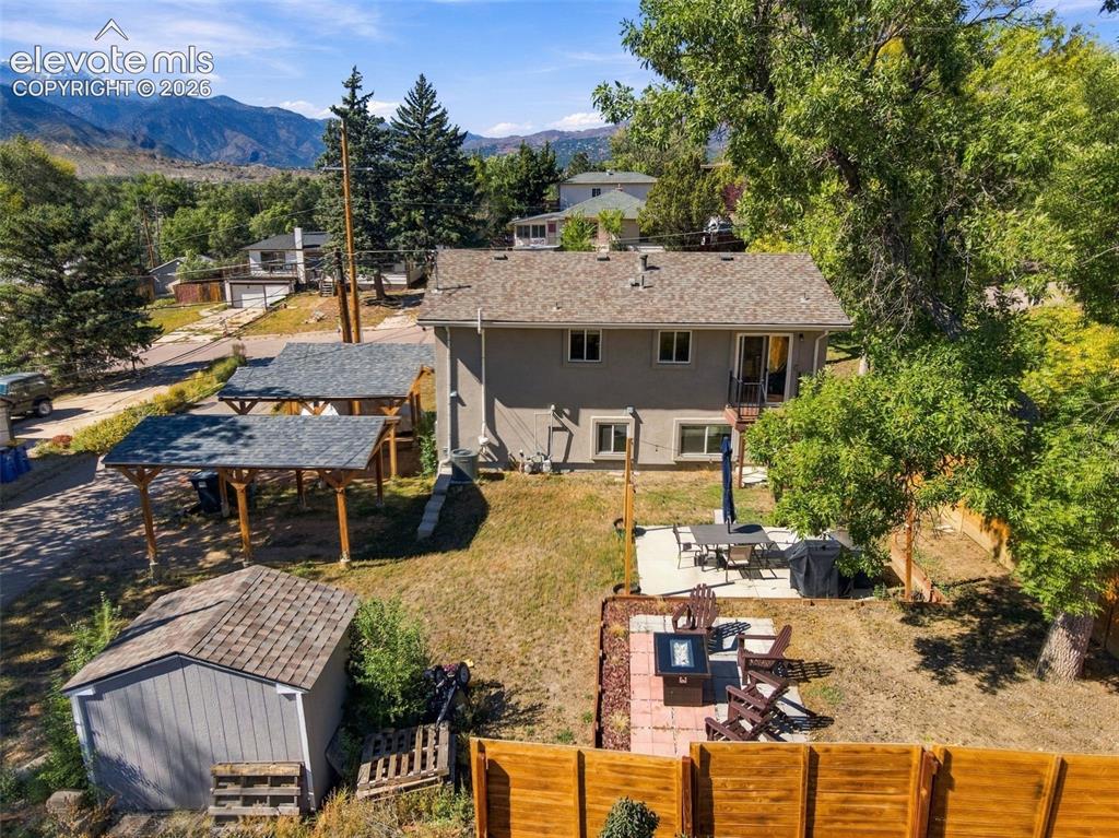 Image 48 of 50: Aerial view or property and back yard