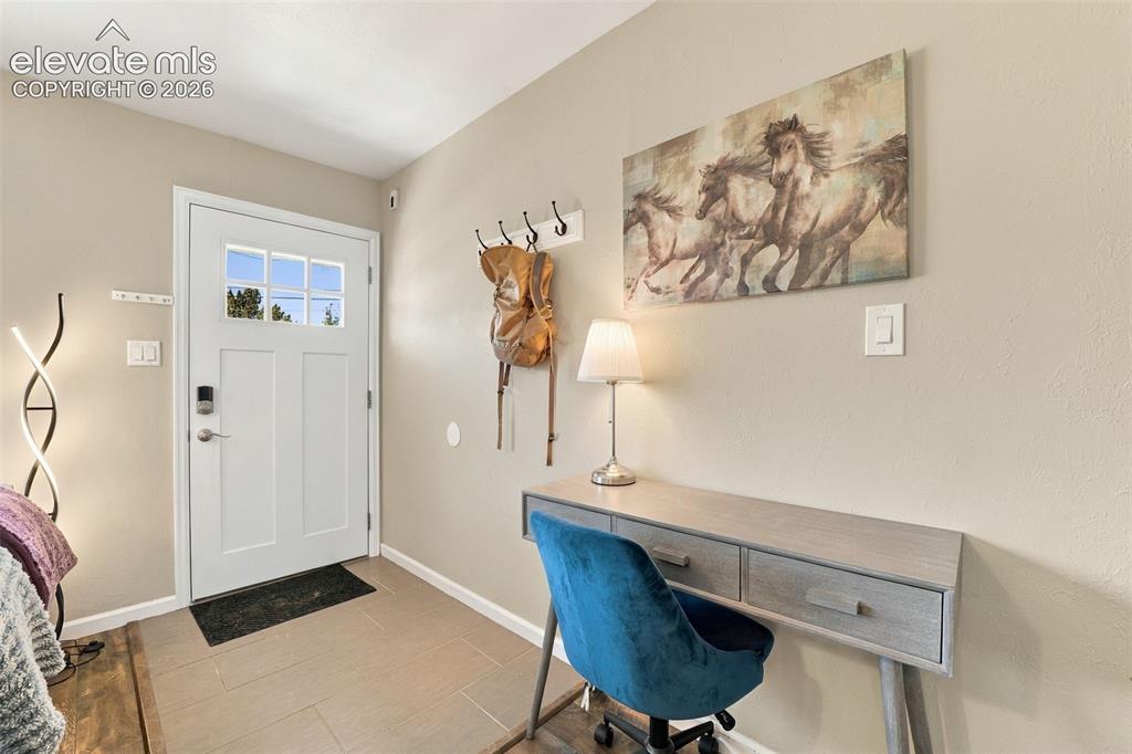 Image 7 of 50: Entryway to upper level unit.