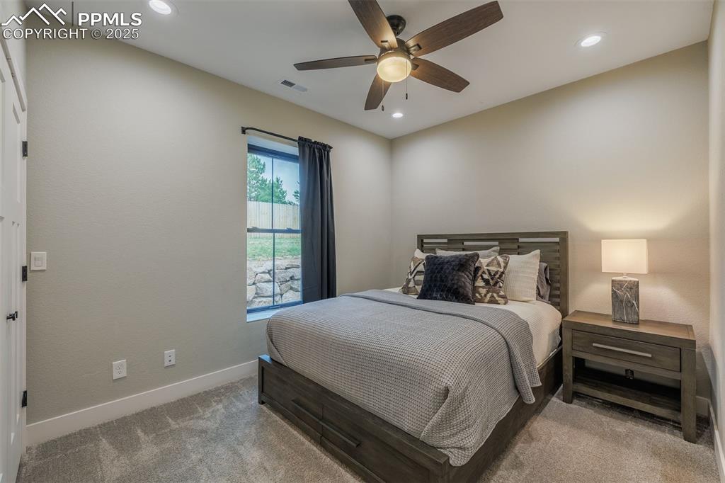 Image 25 of 38: Carpeted bedroom featuring recessed lighting and ceiling fan