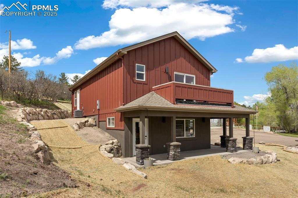 Image 11 of 33: Wrap around porch provides a wonderful covered outdoor area