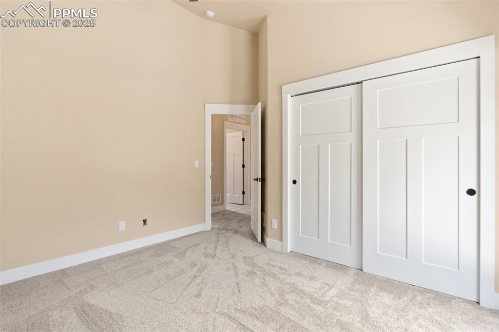 Image 22 of 33: 2nd bedroom on upper level