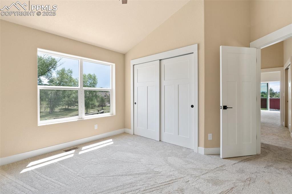 Image 24 of 33: 3rd bedroom on upper level